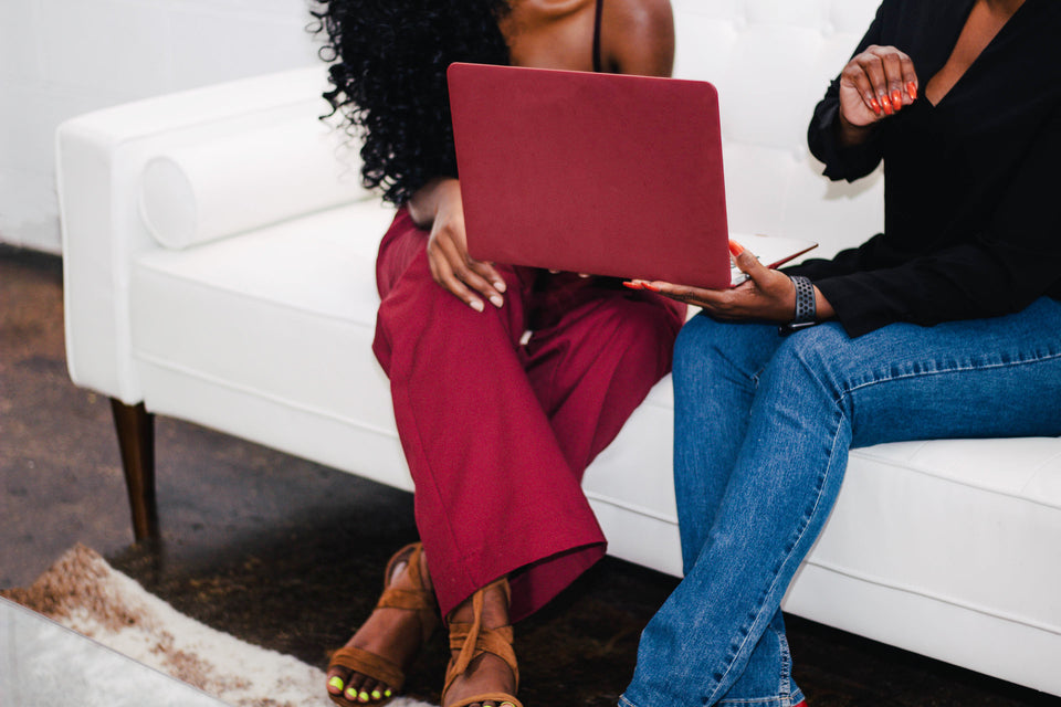 black women working on laptop - Black Business Guide 